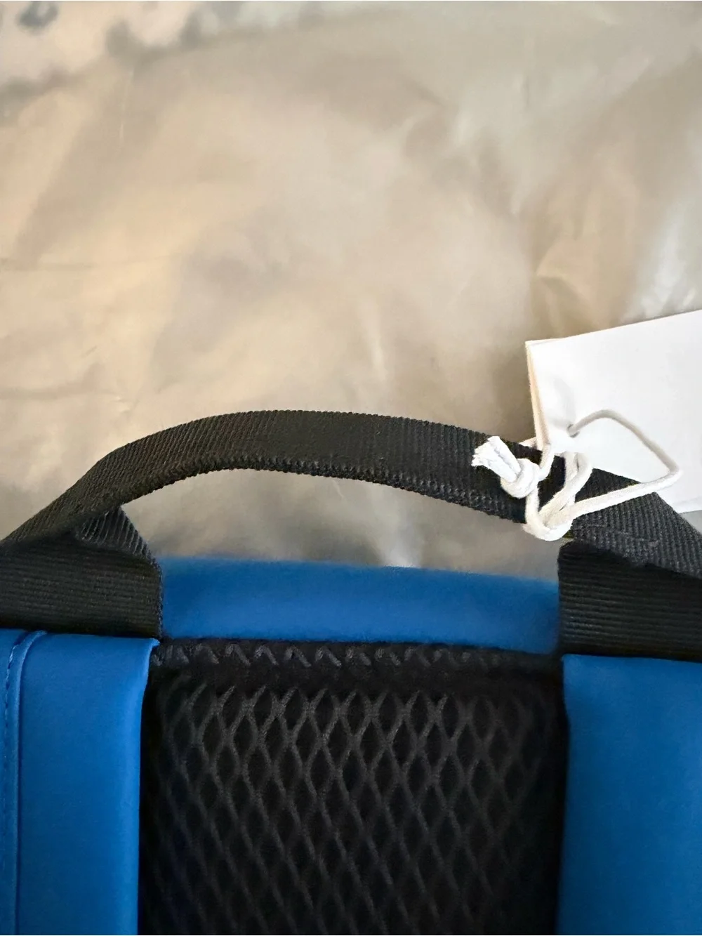 NWt•Rains Blue and Black Roll-Top Backpack•MSRP $155